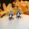 Gradient Turtle Stud Earrings with rainbow zircon stones – black front view. 
