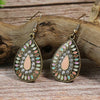 Charm Front profile of boho earrings highlighting the colorful enamel details