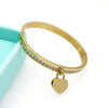 Gold-Plated Heart Charm Cuff Bangle – front view symbolizing love