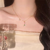Elegant Tulip Pearl Necklace – gold floral pendant with freshwater pearls  ON MODEL 