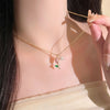 Elegant Tulip Pearl Necklace – gold floral pendant with freshwater pearls  ON MODEL 