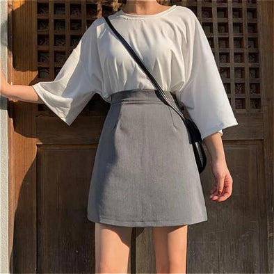 Gray mini skirt front view on model