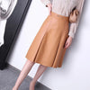 Sophisticated Elegance: Camel Solid Pleated Leather Skirt - Haute Damsel