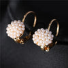 Haute Damsel elegant big simulated pearl earrings