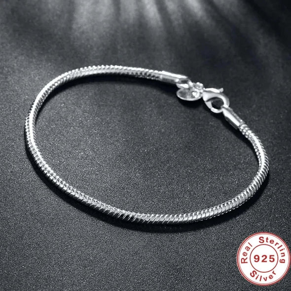 Sterling silver purity stamp (925) highlighted in close-up