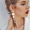 Haute Damsel elegant big simulated pearl earrings