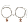 Soft plush bear charm attached to adjustable bracelet chain
