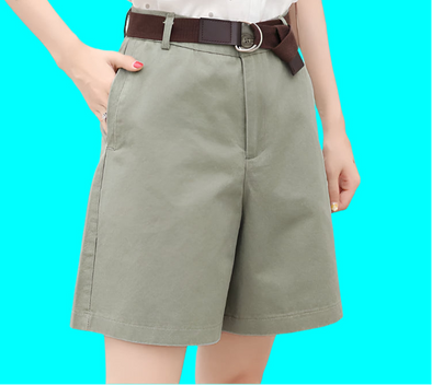 High-waisted wide-leg shorts in light green with belt