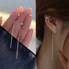 Model  Bohemian Tassel Drop Earrings – front view showcasing star and heart beads with long chains