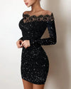  Model at a party wearing the silver sparkle dress