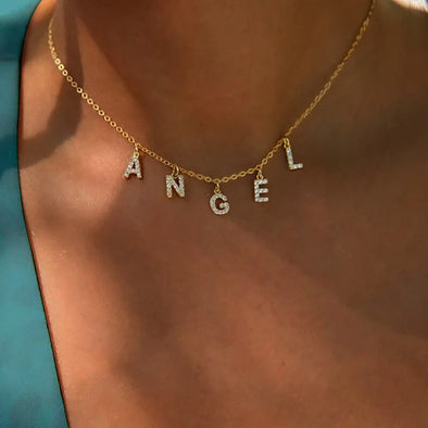 Personalized Letter Necklace with stainless steel alphabet pendant, styled on a model
