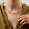 Personalized Letter Necklace with stainless steel alphabet pendant, styled on a model