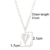 Sun Pendant Heart Necklace – sunburst and heart charms  for a free-spirited vibe