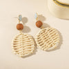 Elevate Your Style: Rattan Raffia Tassel Pendant Earrings by Haute Damsel