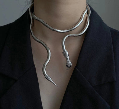 Snake Necklace – coiled pendant on an adjustable chain, styled as a choker and layered necklace