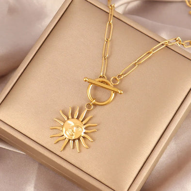 Sun Pendant Heart Necklace – sunburst and heart charms on a stainless steel choker chain
