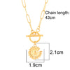 Sun Pendant Heart Necklace – sunburst and heart charms on a stainless steel polished finish