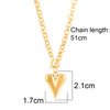 Sun Pendant Heart Necklace – sunburst and heart charms  for a free-spirited vibe