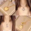 Sun Pendant Heart Necklace – sunburst and heart charms on a stainless steel choker chain