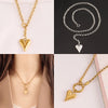 Sun Pendant Heart Necklace – sunburst and heart charms on a stainless steel choker chain