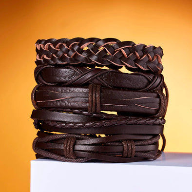 Unisex Leather Couple Bracelet Set – black and brown bracelets on wooden backdrop