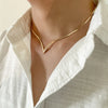 Vintage Flat Snake Chain Necklace with V-Shape Pendant, styled on a male model