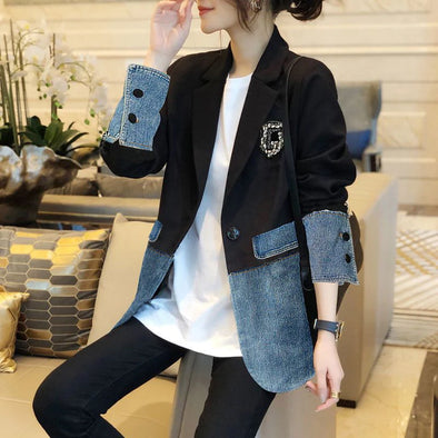 Model posing in layered fall outfit