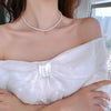 beads Necklace – front view showcasing pendants  details  on a model.