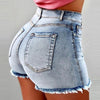  Close-up of ripped details and fringe hem