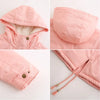 Hood and pocket detail on winter jacket