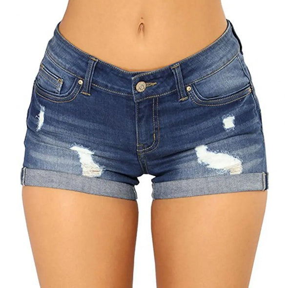  Woman wearing mid-waist ripped denim shorts
