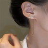 Bohemian Tassel Drop Earrings – front view showcasing star and heart beads with long chains