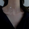 moon and star Pearl Necklace – gold floral pendant  on a model