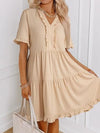 Close-up of notched neckline on soft mini summer dress
