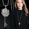 pendant paired with a cozy sweater for everyday elegance