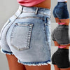  Woman wearing ripped high-waist denim shorts