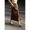 side  view of brown satin split midi skirt