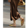 side  view of satin split midi skirt