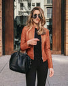 Elegant street style outfit with leather jacket 
