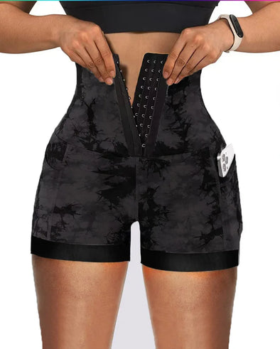 Model wearing tie-dye tummy control shorts