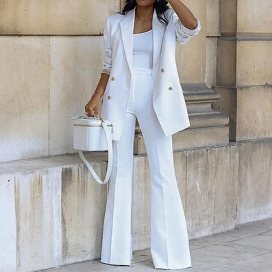 Model wearing two-piece white solid blazer pants suit