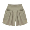  Woman wearing solid color elastic waist casual shorts